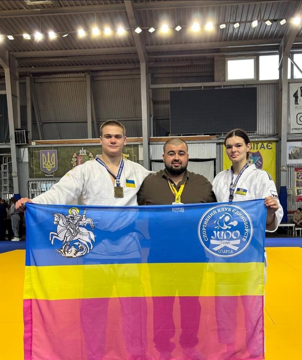 Христина Опанасенко ,  Іван Гармаш з тренером Сергієм Антоняном